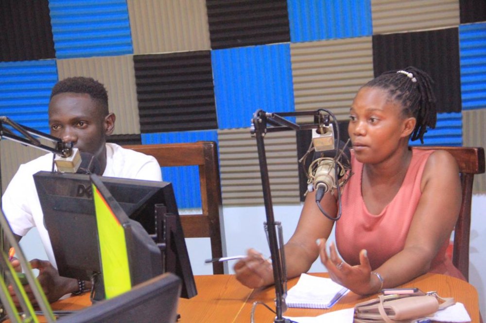 Figure 1 Ms Jennipher a Rights holder in Bukwali Stressing a Point during one of the Live Talk show on Voice of Toro FM